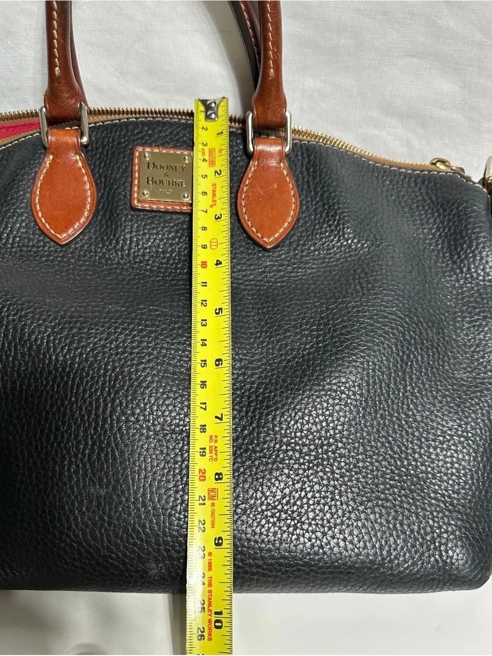 Dooney & Bourke Black Pebbled Leather Satchel with Brown Trim